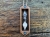 zawieszka-naszyjnik-zaczarowana-klepsydra-topaz-szklo-piasek-drewno-orzech-heban-rekodzielo-bizuteria-drewniana-handmade-5.jpg